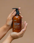 Body cream lotion white turmeric & ylang ylang mourish & soften the skin bodia spa packshot in hand