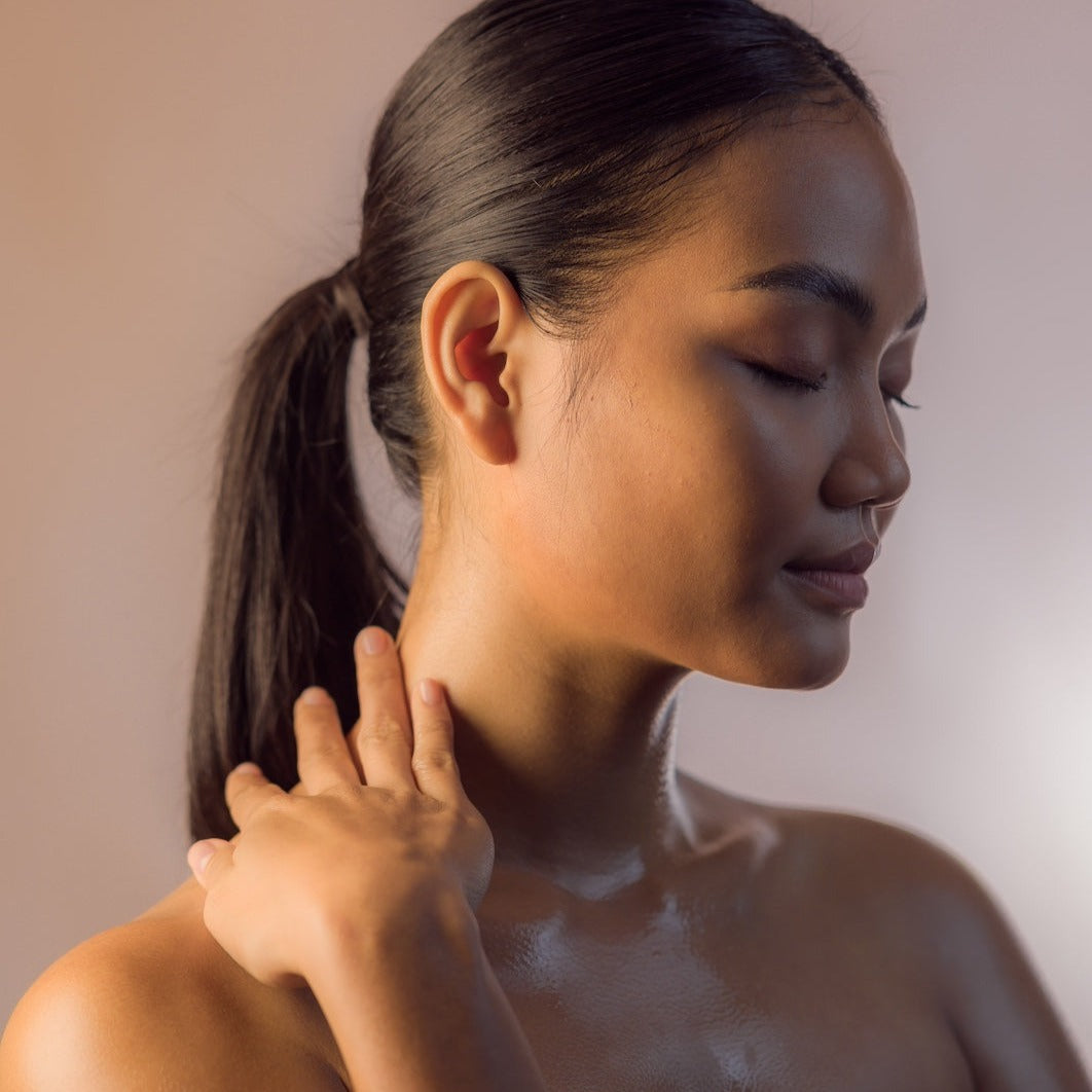 Young woman smile using Universal Dry Oil - left side