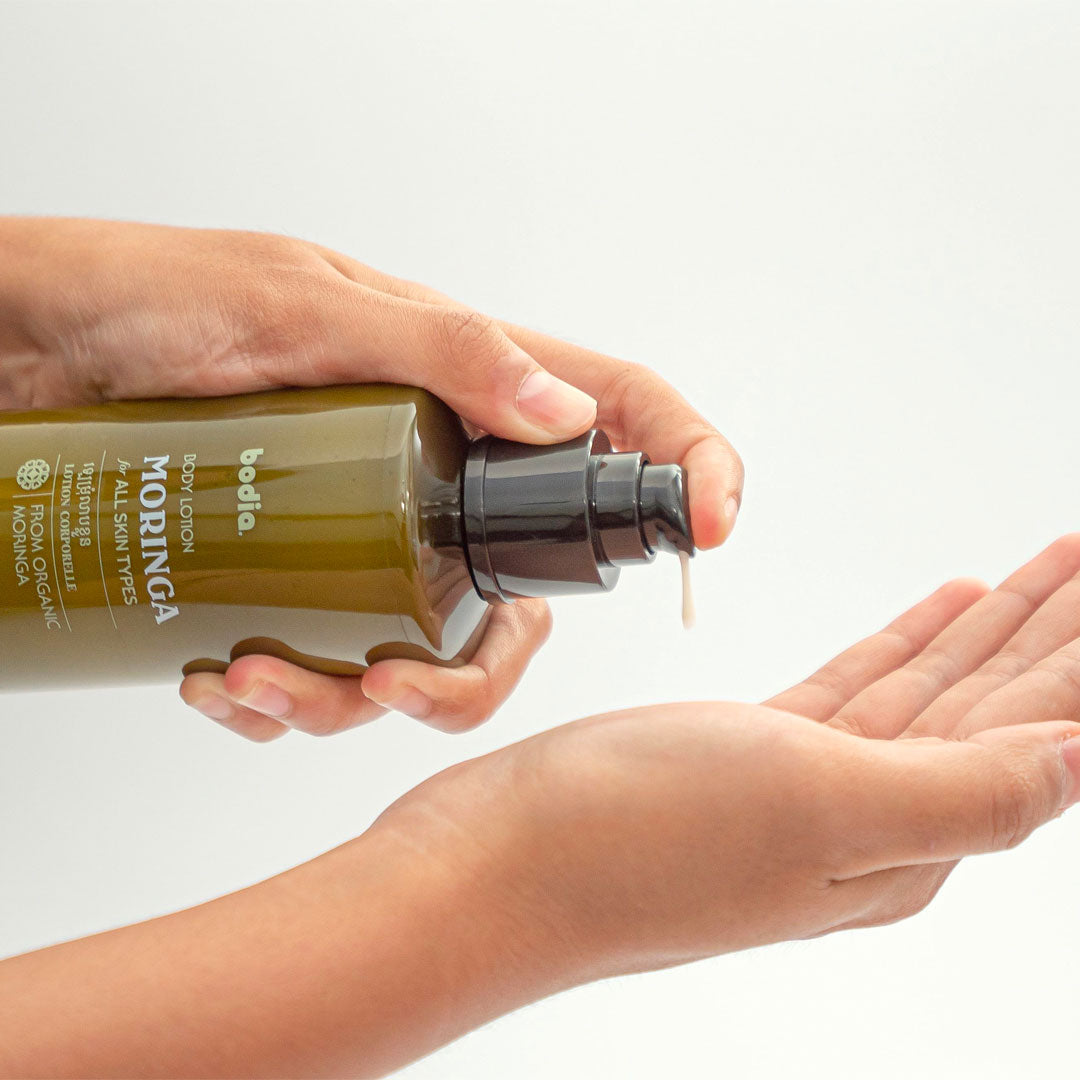 Packshot organic Moringa body lotion cream for all skin type anti aging on hand